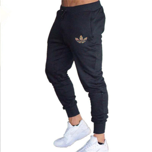 New Brand Print logo Gyms Men Joggers Casual Men Sweatpants Joggers Pantalon Homme Trousers Sporting Clothing Bodybuilding Pants