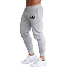 Load image into Gallery viewer, New Brand Print logo Gyms Men Joggers Casual Men Sweatpants Joggers Pantalon Homme Trousers Sporting Clothing Bodybuilding Pants
